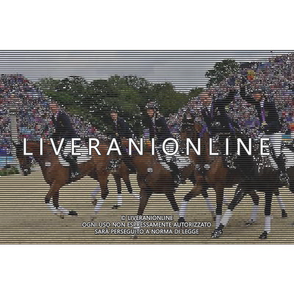 (120731) -- LONDON, July 31, 2012 () -- The team of Germany celebrate after the awarding ceremony of equestrian team eventing at the London 2012 Olympic Games in London, Britain, July 31, 2012. German team claimed the title of this event. (/Gesang Dawa)(zgp) /ALDO LIVERANI SAS-ITALY ONLY - EDITORIAL USE ONLY