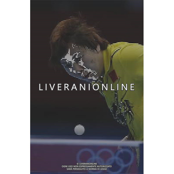 (120731) -- LONDON, July 31, 2012 () -- Li Xiaoxia of China eyes the ball during the semifinal match of women\'s singles table tennis event against Kasumi Ishikawa of Japan at London 2012 Olympic Games, London, Britain, July 31, 2012. Li Xiaoxia won the match 4-1 and advanced to the final. (/Shen Bohan) /ALDO LIVERANI SAS-ITALY ONLY - EDITORIAL USE ONLY