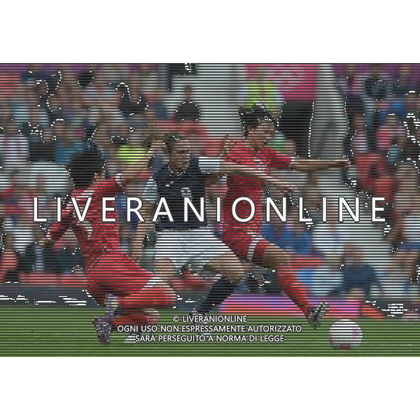 (120731) -- LONDON, July 31, 2012 () -- Heather O\'Reilly of USA (C) competes during women\'s football preliminary round group G match between the United States and the Democratic People\'s Republic of Korea, at London 2012 Olympic Games in Manchester, Britain, on July 31, 2012. (/Wang Qingqin) (nxl) /ALDO LIVERANI SAS-ITALY ONLY - EDITORIAL USE ONLY