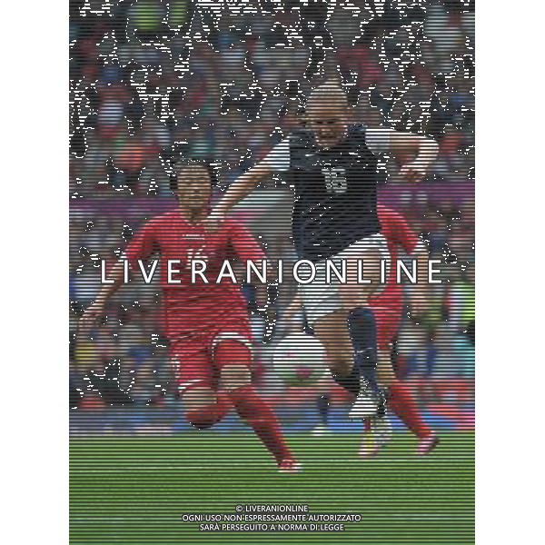 (120731) -- LONDON, July 31, 2012 () -- Rachel Buehler of USA (R) competes during women\'s football preliminary round group G match between the United States and the Democratic People\'s Republic of Korea, at London 2012 Olympic Games in Manchester, Britain, on July 31, 2012. (/Wang Qingqin) (nxl) /ALDO LIVERANI SAS-ITALY ONLY - EDITORIAL USE ONLY
