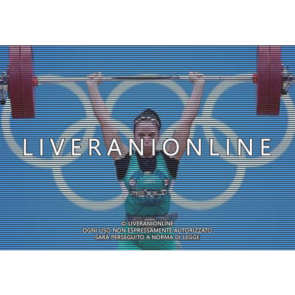 (120731) -- LONDON, July 31, 2012 () -- Luz Mercedes Acosta Valdez of Mexico competes during women\'s weightlifting 63kg competition, at London 2012 Olympic Games in London, Britain, on July 31, 2012. Luz Mercedes Acosta Valdez of Mexico finished sixth. (/Chen Jianli) (nxl) /ALDO LIVERANI SAS-ITALY ONLY - EDITORIAL USE ONLY