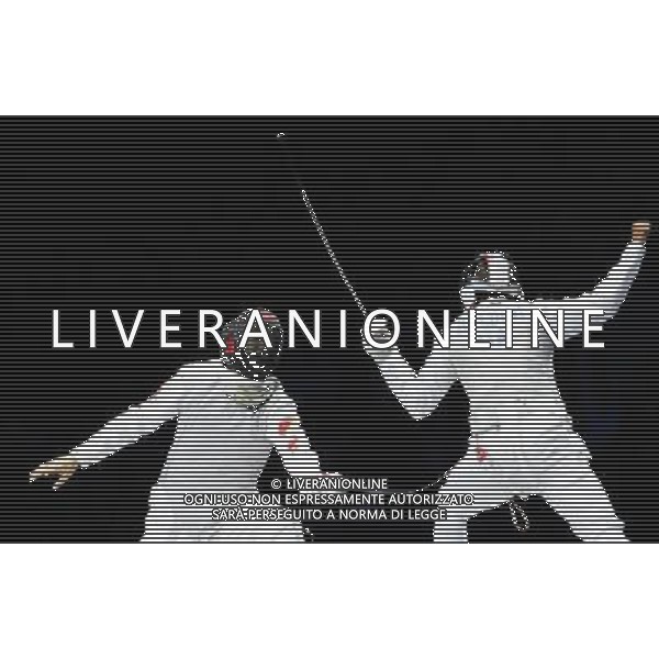 (120731) -- LONDON, July 31, 2012 () -- Lei Sheng (L) of China competes with Andrea Baldini of Italy during men\'s foil individual event of fencing at the London 2012 Olympic Games in London, Britain, July 31, 2012. Lei Sheng defeated Baldini and entered the final. (/Zeng Yi)(zgp) /ALDO LIVERANI SAS-ITALY ONLY - EDITORIAL USE ONLY