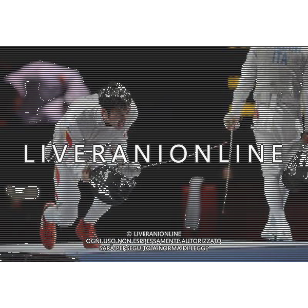 (120731) -- LONDON, July 31, 2012 () -- Lei Sheng (L) of China competes with Andrea Baldini of Italy during men\'s foil individual event of fencing at the London 2012 Olympic Games in London, Britain, July 31, 2012. Lei Sheng defeated Baldini and entered the final. (/Zeng Yi)(zgp) /ALDO LIVERANI SAS-ITALY ONLY - EDITORIAL USE ONLY