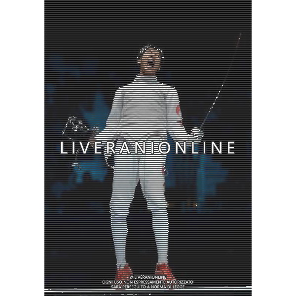 (120731) -- LONDON, July 31, 2012 () -- Lei Sheng of China celebrates after winning Andrea Baldini of Italy during men\'s foil individual event of fencing at the London 2012 Olympic Games in London, Britain, July 31, 2012. Lei Sheng defeated Baldini and entered the final. (/Wang Yuguo)(zgp) /ALDO LIVERANI SAS-ITALY ONLY - EDITORIAL USE ONLY