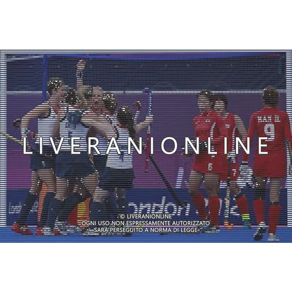 (120731) -- LONDON, July 31, 2012 () -- Hockey players of Britain (L) celebrates for a goal during the women\'s preliminary Pool WA match of hockey between Britain and South Korea at London 2012 Olympic Games, London, Britain, July 31, 2012. Britain won the match 5-3. (/Ren Zhenglai) /ALDO LIVERANI SAS-ITALY ONLY - EDITORIAL USE ONLY