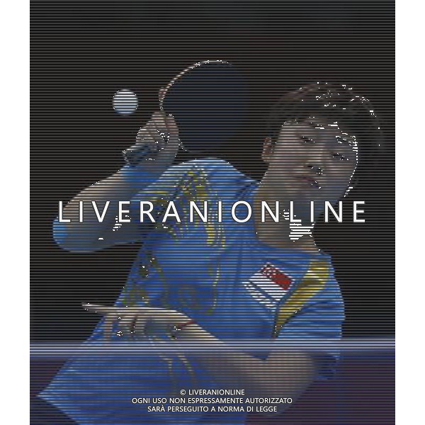 (120731) -- LONDON, July 31, 2012 () -- Feng Tianwei of Singapore returns a ball during the semifinal match of women\'s singles table tennis event againstDing Ning of China at London 2012 Olympic Games, London, Britain, July 31, 2012. Feng Tianwei lost the match 2-4. (/Shen Bohan) /ALDO LIVERANI SAS-ITALY ONLY - EDITORIAL USE ONLY