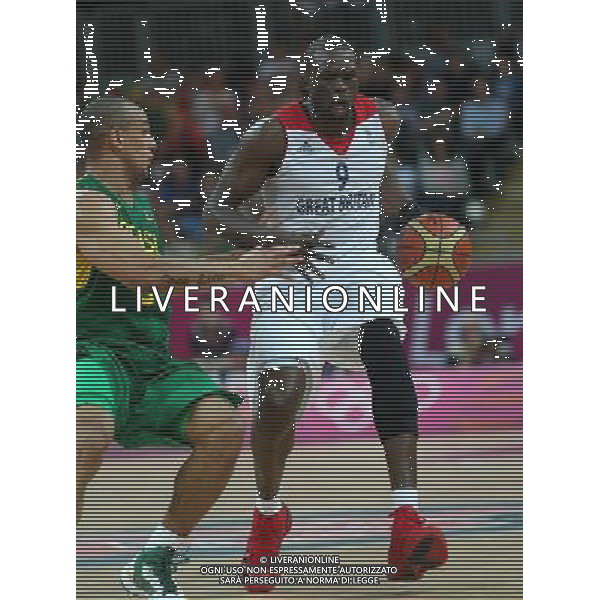 (120731) -- LONDON, July 31, 2012 () -- Luol Deng of Britain (No.9) competes during men\'s basketball preliminary round group B match between Brazil and Britain, at London 2012 Olympic Games in London, Britain, on July 31, 2012. Brazil defeated Britain 67-62. (/Meng Yongmin) (nxl) /ALDO LIVERANI SAS-ITALY ONLY - EDITORIAL USE ONLY