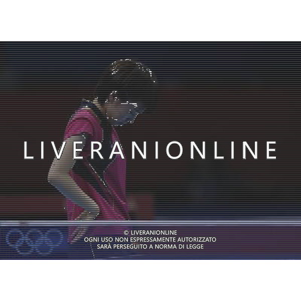 (120731) -- LONDON, July 31, 2012 () -- Kasumi Ishikawa of Japan ponders during the semifinal match of women\'s singles table tennis against Li Xiaoxia of China at London 2012 Olympic Games, London, Britain, July 31, 2012. Kasumi Ishikawa lost the match. (/Shen Bohan) /ALDO LIVERANI SAS-ITALY ONLY - EDITORIAL USE ONLY