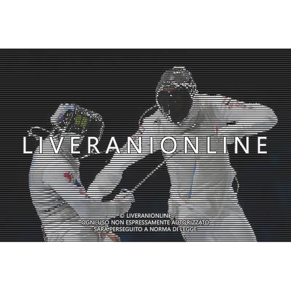 (120731) -- LONDON, July 31, 2012 () -- Alaaeldin Abouelkassam (R) of Egypt competes with Choi Byungchul of South Korea during men\'s foil individual semifinal match of fencing at the London 2012 Olympic Games in London, Britain, July 31, 2012. Alaaeldin Abouelkassam won the match 15-12, and advanced to the final. (/Zeng Yi) /ALDO LIVERANI SAS-ITALY ONLY - EDITORIAL USE ONLY