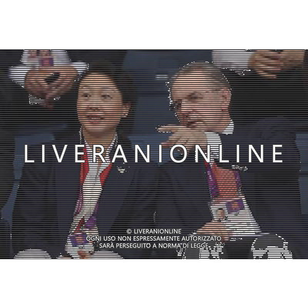 (120731) -- LONDON, July 31, 2012 () -- President of International Olympic Committee (IOC) Jacques Rogge (R) and Li Lingwei, China\'s former badminton player and new IOC member, watch the badminton competition at the London 2012 Olympic Games in London, Britain, July 31, 2012. (/Tang Shi)(zgp) /ALDO LIVERANI SAS-ITALY ONLY - EDITORIAL USE ONLY