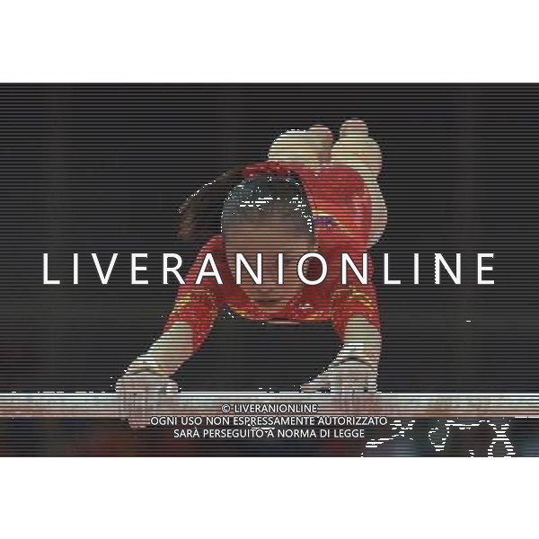 (120731) -- LONDON, July 31, 2012 () -- Yao Jinnan of China competes in uneven bars event of Gymnastics Artistic women\'s team final competition at London 2012 Olympic Games in London, Britain, July 31, 2012. The Chinese team ranked fourth in this event. (/Cheng Min) (zgp) /ALDO LIVERANI SAS-ITALY ONLY - EDITORIAL USE ONLY