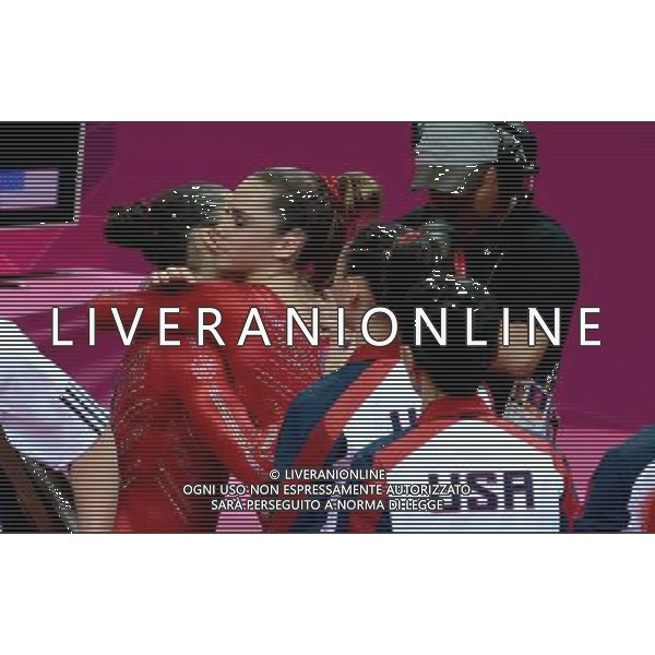 (120731) -- LONDON, July 31, 2012 () -- Gymnasts of U.S. celebrate after Gymnastics Artistic women\'s team final competition at London 2012 Olympic Games in London, Britain, July 31, 2012. The U.S. team won gold medal in this event. (/Wang Jianhua) (zgp) /ALDO LIVERANI SAS-ITALY ONLY - EDITORIAL USE ONLY