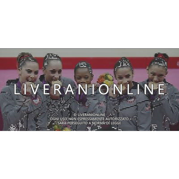 (120731) -- LONDON, July 31, 2012 () -- Gymnasts of U.S. pose at the awarding ceremony of Gymnastics Artistic women\'s team competition at London 2012 Olympic Games in London, Britain, July 31, 2012. The U.S. team won gold medal in this event. (/Wang Lili) (zgp) /ALDO LIVERANI SAS-ITALY ONLY - EDITORIAL USE ONLY