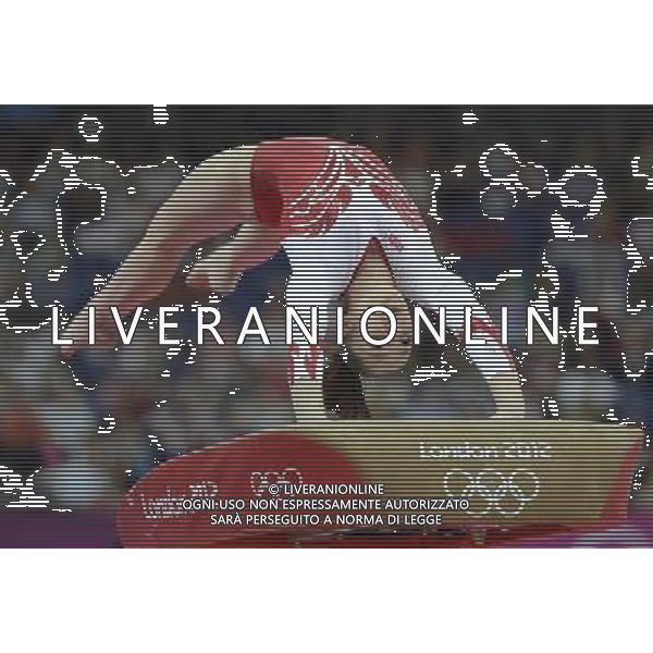 (120731) -- LONDON, July 31, 2012 () -- Aliya Mustafina of Russia competes in vault event of Gymnastics Artistic women\'s team final competition at London 2012 Olympic Games in London, Britain, July 31, 2012. The Russian team won silver medal in this event. (/Qi Heng) (zgp) /ALDO LIVERANI SAS-ITALY ONLY - EDITORIAL USE ONLY