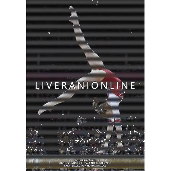 (120731) -- LONDON, July 31, 2012 () -- Victoria Komova of Russia competes in beam event of Gymnastics Artistic women\'s team final competition at London 2012 Olympic Games in London, Britain, July 31, 2012. The Russian team won silver medal in this event. (/Qi Heng) (zgp) /ALDO LIVERANI SAS-ITALY ONLY - EDITORIAL USE ONLY