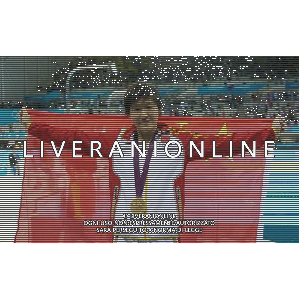 (120731) -- LONDON, July 31, 2012 () -- Gold medalist Ye Shiwen of China poses after the awarding ceremony of women¡¯s 200m individual medley swimming event at London 2012 Olympic Games in London, Britain, on July 31, 2012. Ye Shiwen won the gold medal of the event with a time of 2:07.57 and set a new Olympic Games record. (/Fei Maohua) /ALDO LIVERANI SAS-ITALY ONLY - EDITORIAL USE ONLY