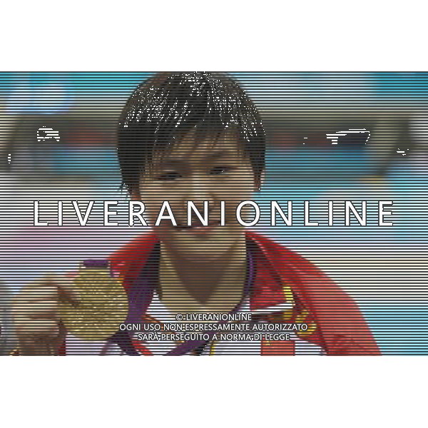 (120731) -- LONDON, July 31, 2012 () -- Gold medalist Ye Shiwen of China poses at the awarding ceremony of women¡¯s 200m individual medley swimming event at London 2012 Olympic Games in London, Britain, on July 31, 2012. Ye Shiwen won the gold medal of the event with a time of 2:07.57 and set a new Olympic Games record. (/Fei Maohua) /ALDO LIVERANI SAS-ITALY ONLY - EDITORIAL USE ONLY