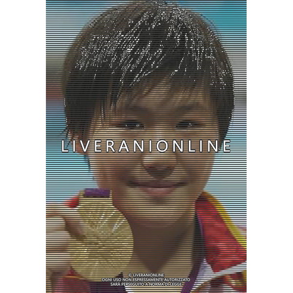 (120731) -- LONDON, July 31, 2012 () -- Gold medalist Ye Shiwen of China poses at the awarding ceremony of women¡¯s 200m individual medley swimming event at London 2012 Olympic Games in London, Britain, on July 31, 2012. Ye Shiwen won the gold medal of the event with a time of 2:07.57 and set a new Olympic Games record. (/Fei Maohua) /ALDO LIVERANI SAS-ITALY ONLY - EDITORIAL USE ONLY