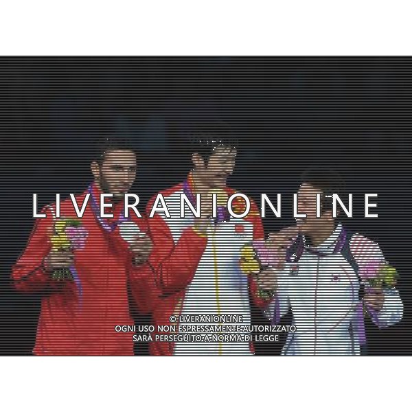 (120731) -- LONDON, July 31, 2012 () ¬C Lei Sheng (C) of China, Alaaeldin Abouelkassem (L) of Egypt, Choi Byungchul of South Korea attend the awarding ceremony of men\'s fencing Foil individual event at London 2012 Olympic Games in London, Britain, July 31, 2012. (/Zeng Yi) (zgp) /ALDO LIVERANI SAS-ITALY ONLY - EDITORIAL USE ONLY