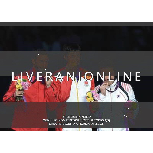(120731) -- LONDON, July 31, 2012 () ¬C Lei Sheng (C) of China, Alaaeldin Abouelkassem (L) of Egypt, Choi Byungchul of South Korea attend at the awarding ceremony of men\'s fencing Foil individual event at London 2012 Olympic Games in London, Britain, July 31, 2012. (/Zeng Yi) (zgp) /ALDO LIVERANI SAS-ITALY ONLY - EDITORIAL USE ONLY