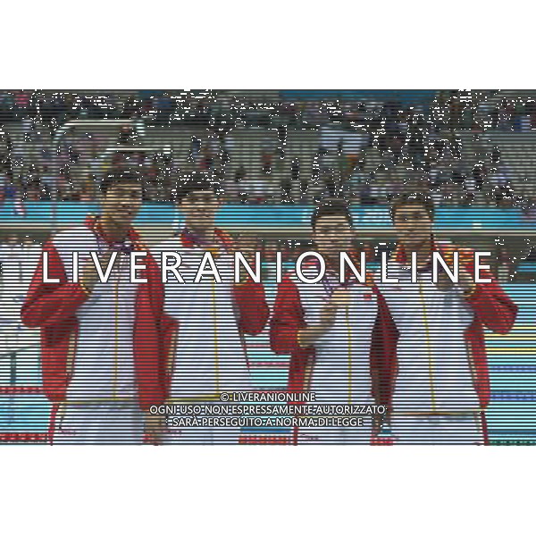 (120731) -- LONDON, July 31, 2012 () -- Swimmers of China pose at the awarding ceremony of men\'s 4x200m freestyle relay of swimming at the London 2012 Olympic Games in London, Britain, July 31, 2012. Chinese swimmers won the bronze medal in this event. (/Fei Maohua)(zgp) /ALDO LIVERANI SAS-ITALY ONLY - EDITORIAL USE ONLY