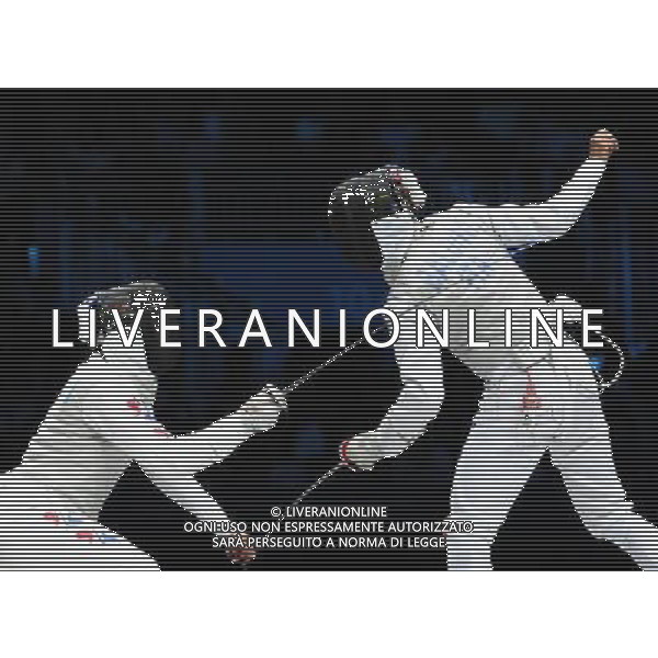 (120731) -- LONDON, July 31, 2012 () ¬C Choi Byungchul (L) of South Korea competes with Andrea Baldini of Italy during bronze medal match of men\'s fencing Foil individual event at London 2012 Olympic Games in London, Britain, July 31, 2012. Choi Byungchul won the bronze medal. (/Zeng Yi) (zgp) /ALDO LIVERANI SAS-ITALY ONLY - EDITORIAL USE ONLY
