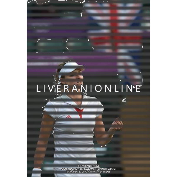 (120731) -- LONDON, July 31, 2012 () -- Maria Kirilenko of Russia celebrates a point during the 2nd round match of women\'s singles tennis event against Heather Watson of Britain at London 2012 Olympic Games, London, Britain, July 31, 2012. Maria Kirilenko won the match 2-0. (/Tao Xiyi) /ALDO LIVERANI SAS-ITALY ONLY - EDITORIAL USE ONLY