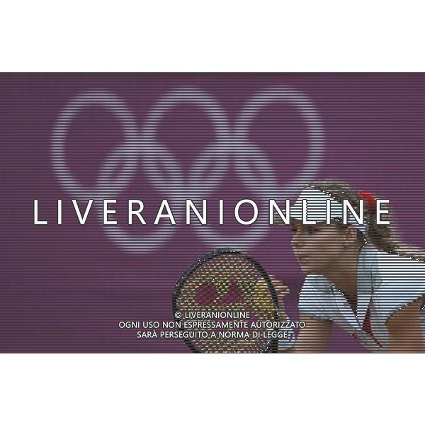 (120731) -- LONDON, July 31, 2012 () -- Maria Kirilenko of Russia eyes the ball during the 2nd round match of women\'s singles tennis event against Heather Watson of Britain at London 2012 Olympic Games, London, Britain, July 31, 2012. Maria Kirilenko won the match 2-0. (/Tao Xiyi) /ALDO LIVERANI SAS-ITALY ONLY - EDITORIAL USE ONLY
