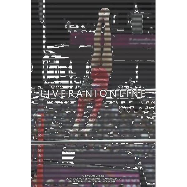 American Gymnast Gabrielle Douglas seen on the uneven bars during the Gymnastics Artistic Womens Team event at the O2 North Greenwich,. London ©PHOTOSHOT/AGENZIA ALDO LIVERANI SAS - ITALY ONLY - GIOCHI OLIMPICI, OLIMPIADI LONDRA 2012