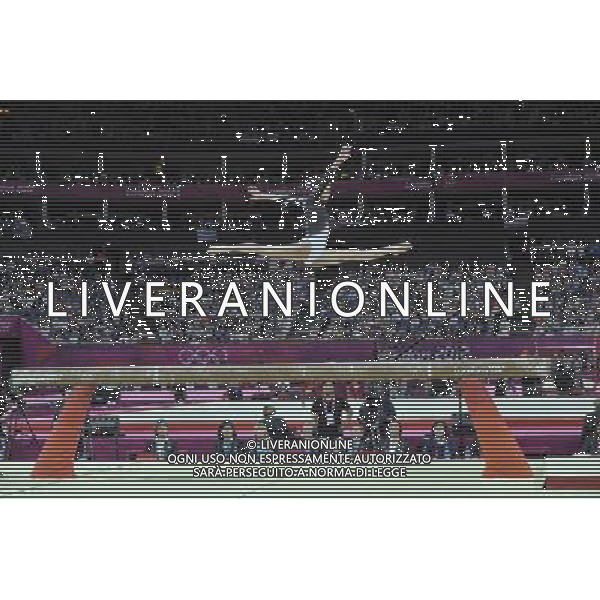 Japanese Gymnast Yuko Shintake seen on the beam during the Gymnastics Artistic Womens Team event at the O2 North Greenwich,. London ©PHOTOSHOT/AGENZIA ALDO LIVERANI SAS - ITALY ONLY - GIOCHI OLIMPICI, OLIMPIADI LONDRA 2012