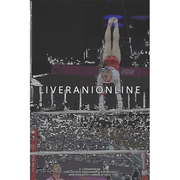 Russian Gymnast Aliya Mustafina seen on the uneven bars during the Gymnastics Artistic Womens Team event at the O2 North Greenwich,. London ©PHOTOSHOT/AGENZIA ALDO LIVERANI SAS - ITALY ONLY - GIOCHI OLIMPICI, OLIMPIADI LONDRA 2012