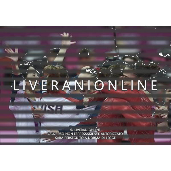 (120731) -- LONDON, July 31, 2012 () -- Gymnasts of U.S. celebrate after Gymnastics Artistic women\'s team final competition at London 2012 Olympic Games in London, Britain, July 31, 2012. The U.S. team won gold medal in this event. (/Qi Heng) (zgp) ©PHOTOSHOT/AGENZIA ALDO LIVERANI SAS - ITALY ONLY - GIOCHI OLIMPICI, OLIMPIADI LONDRA 2012