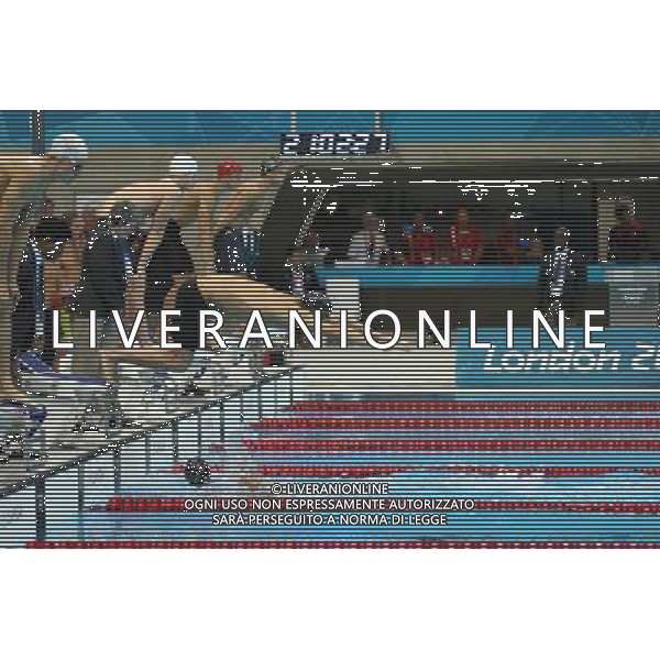 (120731) -- LONDON, July 31, 2012 () -- Michael Phelps of U.S. starts during men\'s 4x200m freestyle relay of swimming at the London 2012 Olympic Games in London, Britain, July 31, 2012. The U.S. swimmers claimed the title in this event. (/Fei Maohua)(zgp) ©PHOTOSHOT/AGENZIA ALDO LIVERANI SAS - ITALY ONLY - GIOCHI OLIMPICI, OLIMPIADI LONDRA 2012