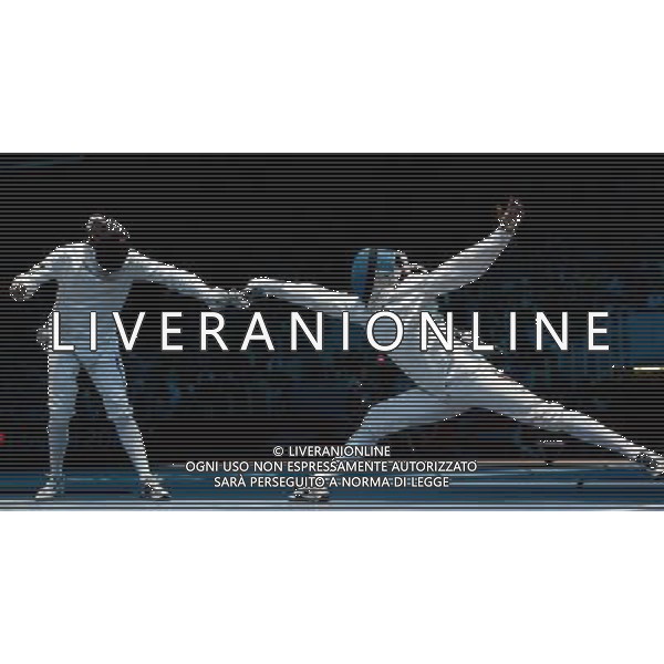 (120801) -- LONDON, Aug. 1, 2012 () -- Silvio Fernandez (R) of Venezuela competes with Ruslan Kudayev of Uzbekistan during men\'s fencing Epee individual round of 16 match, at London 2012 Olympic Games in London, Britain, on August 1, 2012. Silvio Fernandez won 15-3. (/Wang Qingqin) (nxl) ©PHOTOSHOT/AGENZIA ALDO LIVERANI SAS - ITALY ONLY - GIOCHI OLIMPICI, OLIMPIADI LONDRA 2012