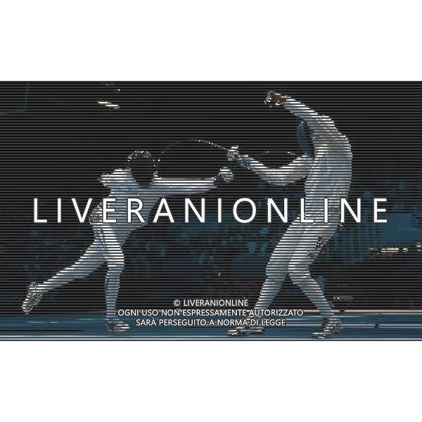 (120801) -- LONDON, Aug. 1, 2012 () -- Silvio Fernandez (R) of Venezuela competes with Ruslan Kudayev of Uzbekistan during men\'s fencing Epee individual round of 16 match, at London 2012 Olympic Games in London, Britain, on August 1, 2012. Silvio Fernandez won 15-3. (/Wang Qingqin) (nxl) ©PHOTOSHOT/AGENZIA ALDO LIVERANI SAS - ITALY ONLY - GIOCHI OLIMPICI, OLIMPIADI LONDRA 2012