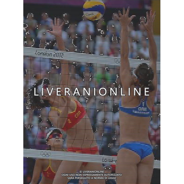 (120801) -- LONDON, Aug. 1, 2012 () -- Arvaniti/Tsiartsiani of Greece (in blue) competes with Zhang Xi/Xue Chen of China during women\'s beach volleyball preliminary phase match, at London 2012 Olympic Games in London, Britain, on August 1, 2012. Arvaniti/Tsiartsiani of Greece lost to Zhang Xi/Xue Chen of China 0-2. (/Gesang Dawa) (nxl) ©PHOTOSHOT/AGENZIA ALDO LIVERANI SAS - ITALY ONLY - GIOCHI OLIMPICI, OLIMPIADI LONDRA 2012