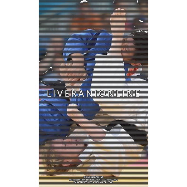 (120801) -- LONDON, Aug. 1, 2012 () -- Chen Fei of China (in blue) competes with Kerstin Thiele of Germany during women\'s Judo 70kg semifinal contest, at London 2012 Olympic Games in London, Britain, on August 1, 2012. Kerstin Thiele of Germany won. (/Wu Xiaoling) (nxl) ©PHOTOSHOT/AGENZIA ALDO LIVERANI SAS - ITALY ONLY - GIOCHI OLIMPICI, OLIMPIADI LONDRA 2012