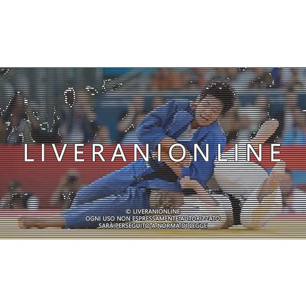 (120801) -- LONDON, Aug. 1, 2012 () -- Chen Fei of China (in blue) competes with Kerstin Thiele of Germany during women\'s Judo 70kg semifinal contest, at London 2012 Olympic Games in London, Britain, on August 1, 2012. Kerstin Thiele of Germany won. (/Wu Xiaoling) (nxl) ©PHOTOSHOT/AGENZIA ALDO LIVERANI SAS - ITALY ONLY - GIOCHI OLIMPICI, OLIMPIADI LONDRA 2012