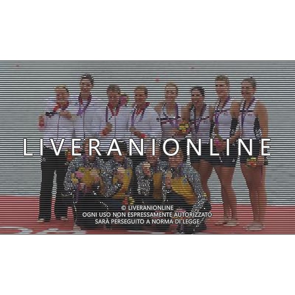 (120801) -- LONDON, Aug. 1, 2012 () -- Gold medalists of Ukraine team (front), silver medalists of German team (L) and bronze medalists of USA team pose for pictures during victory ceremony of women\'s rowing quadruple sculls contest, at London 2012 Olympic Games in London, Britain, on August 1, 2012. The Ukrainian team won gold medal. (/Li Gang) (nxl) ©PHOTOSHOT/AGENZIA ALDO LIVERANI SAS - ITALY ONLY - GIOCHI OLIMPICI, OLIMPIADI LONDRA 2012