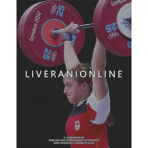 (120801) -- LONDON, Aug. 1, 2012 () -- Marie-Eve Beauchemin-Nadeau of Canada competes during the women\'s 69kg weightlifting event at London 2012 Olympic Games, London, Britain, Aug. 1, 2012. Marie-Eve Beauchemin-Nadeau ranked the 1st of group B with a total of 239kg. (/Chen Jianli) ©PHOTOSHOT/AGENZIA ALDO LIVERANI SAS - ITALY ONLY - GIOCHI OLIMPICI, OLIMPIADI LONDRA 2012