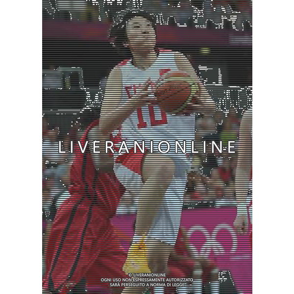(120801) -- LONDON, Aug. 1, 2012 () -- Zhang Fan of China breaks through during women\'s basketball group match between China and Angola, at London 2012 Olympic Games in London, Britain, August 1, 2012. China defeated Angola 76-52. (/Meng Yongmin) (zgp) ©PHOTOSHOT/AGENZIA ALDO LIVERANI SAS - ITALY ONLY - GIOCHI OLIMPICI, OLIMPIADI LONDRA 2012