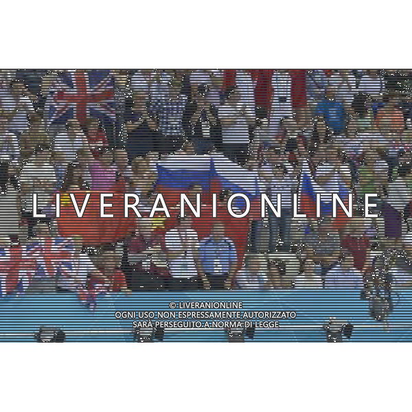 Fans show their support for their teams during the Men\'s Synchronised 3m Springboard at the Aquatics Centre, Olympic Park, Stratford . London /ALDO LIVERANI SAS-ITALY ONLY - EDITORIAL USE ONLY