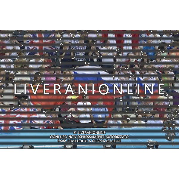 Fans show their support for their teams during the Men\'s Synchronised 3m Springboard at the Aquatics Centre, Olympic Park, Stratford . London /ALDO LIVERANI SAS-ITALY ONLY - EDITORIAL USE ONLY