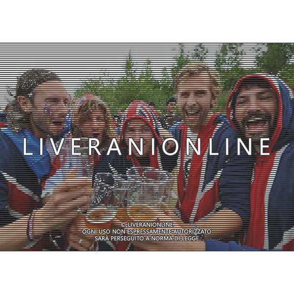 (left to right) Dan Welham, Peter Landers, Chris Daniel, Robert Maxwell, and Don Wilkinson (left to right) celebrate the first gold Medal won by Team GB Rowers, after watching it on giant screens in the Olympic Park, in Stratford east London. Wednesday August 1, 2012. /ALDO LIVERANI SAS-ITALY ONLY - EDITORIAL USE ONLY
