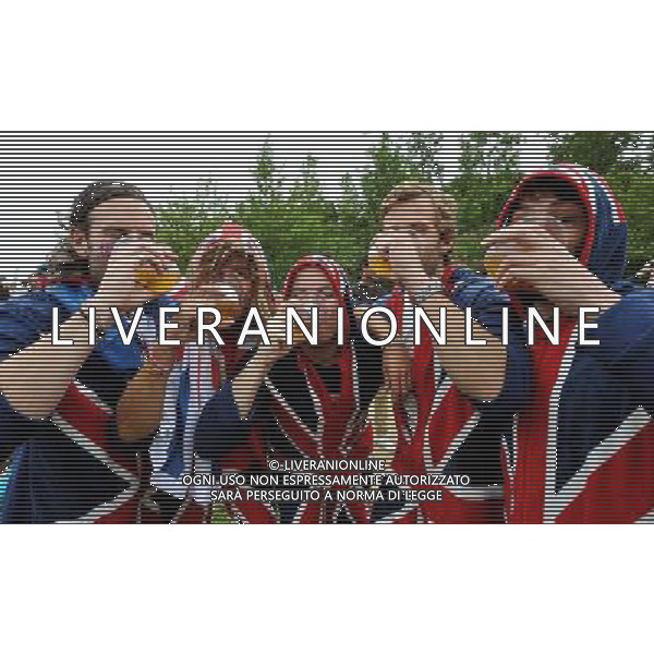 (left to right) Dan Welham, Peter Landers, Chris Daniel, Robert Maxwell, and Don Wilkinson (left to right) celebrate the first gold Medal won by Team GB Rowers, after watching it on giant screens in the Olympic Park, in Stratford east London. Wednesday August 1, 2012. /ALDO LIVERANI SAS-ITALY ONLY - EDITORIAL USE ONLY