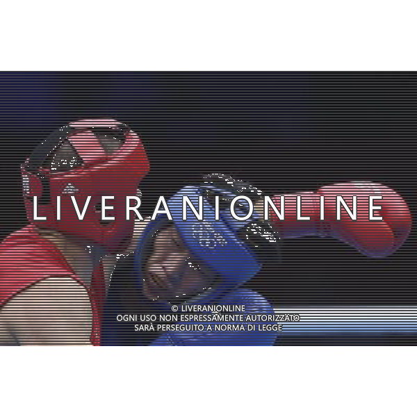 (120801) -- LONDON, Aug. 1, 2012 () -- Wang Xuanxuan of China (in blue) fights with Tervel Pulev of Bulgaria during men\'s boxing heavy (91kg) preliminaries session 9 contest, at London 2012 Olympic Games in London, Britain, on August 1, 2012. Wang Xuanxuan of China lost 7-10. (/Wang Shen) (nxl) /ALDO LIVERANI SAS-ITALY ONLY - EDITORIAL USE ONLY