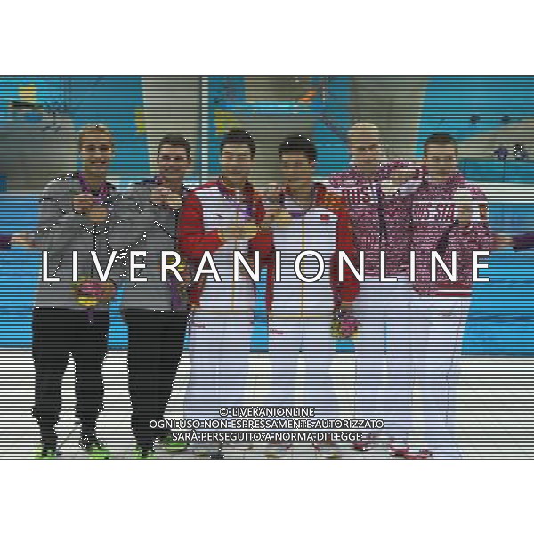 (120801) -- LONDON, Aug. 1, 2012 () -- Gold medalists Qin Kai (3rd L)/Luo Yutong (3rd R) of China, silver medalists Ilya Zakharov Evgeny Kuznetsov of Russia, and bronze medalists Kristian Ipsen/Troy Dumais of U.S. pose at the awarding ceremony of men\'s synchronised 3m springboard event at the London 2012 Olympic Games in London, Britain, Aug. 1, 2012. The Chinese divers claimed the title in this event. (/Fei Maohua)(zgp) /ALDO LIVERANI SAS-ITALY ONLY - EDITORIAL USE ONLY
