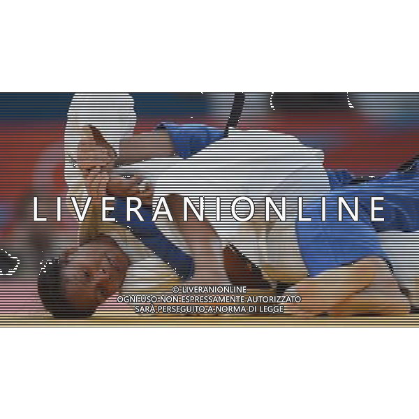 (120801) -- LONDON, Aug. 1, 2012 () -- Yuri Alvear of Colombia (in white) competes with Chen Fei of China during women\'s Judo 70kg bronze medal contest, at London 2012 Olympic Games in London, Britain, on August 1, 2012. Yuri Alvear of Colombia defeated Chen Fei of China. (/Wu Xiaoling) (nxl) /ALDO LIVERANI SAS-ITALY ONLY - EDITORIAL USE ONLY