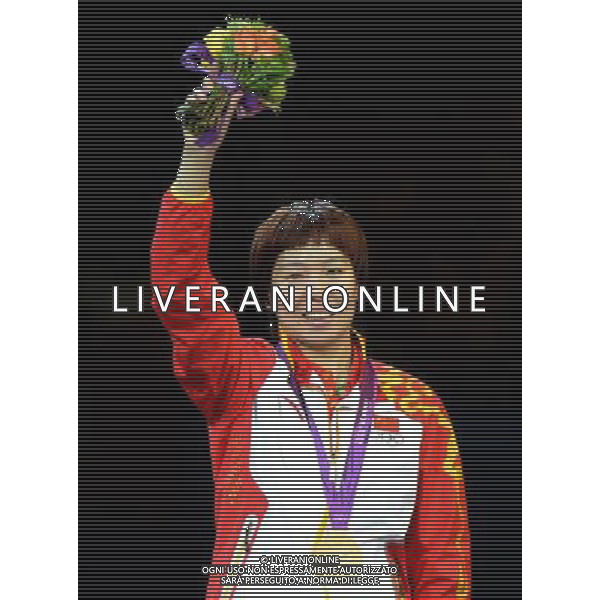 (120801) -- LONDON, Aug. 1, 2012 () -- Li Xiaoxia of China celebrates at the awarding ceremony of table tennis women\'s singles event at London 2012 Olympic Games, London, Britain, Aug. 1, 2012. Li claimed the gold medal of the event. (/Wang Yuguo) /ALDO LIVERANI SAS-ITALY ONLY - EDITORIAL USE ONLY