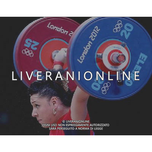 (120801) -- LONDON, Aug. 1, 2012 () -- Roxana Daniela Cocos of Romania competes during the women\'s 69kg weightlifting event at London 2012 Olympic Games, London, Britain, Aug. 1, 2012. Roxana Daniela Cocos won the silver medal of the event with a total of 256kg. (/Chen Jianli) /ALDO LIVERANI SAS-ITALY ONLY - EDITORIAL USE ONLY